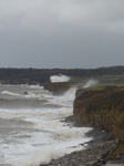 LZ00680 Waves crashing against cliffs at Llantwit Major beach.jpg